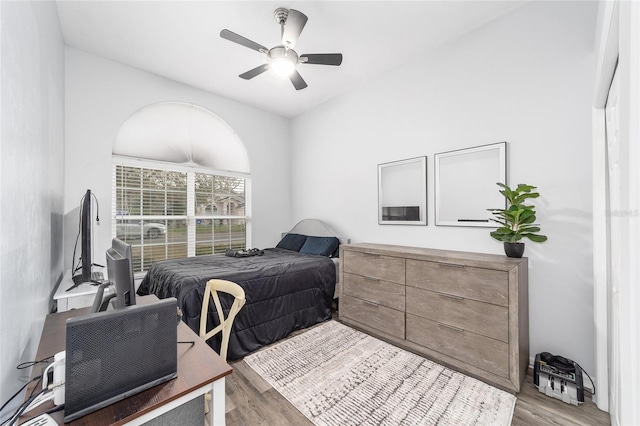 bedroom featuring light wood-type flooring and ceiling fan