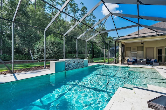 view of swimming pool with ceiling fan, an outdoor living space, glass enclosure, and a patio