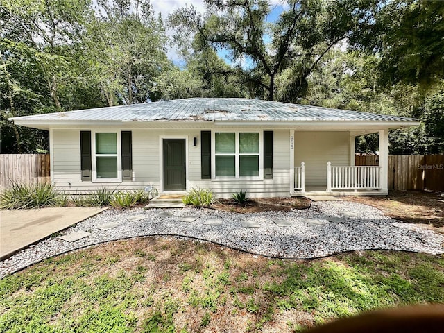 ranch-style home with covered porch