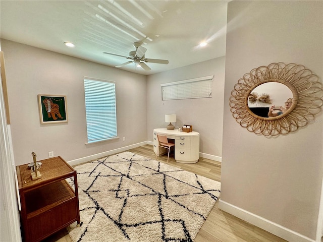 office area featuring ceiling fan and wood-type flooring