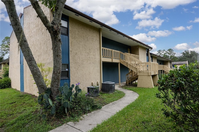 view of building exterior featuring central AC