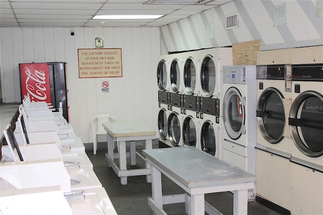 community laundry room featuring visible vents and separate washer and dryer