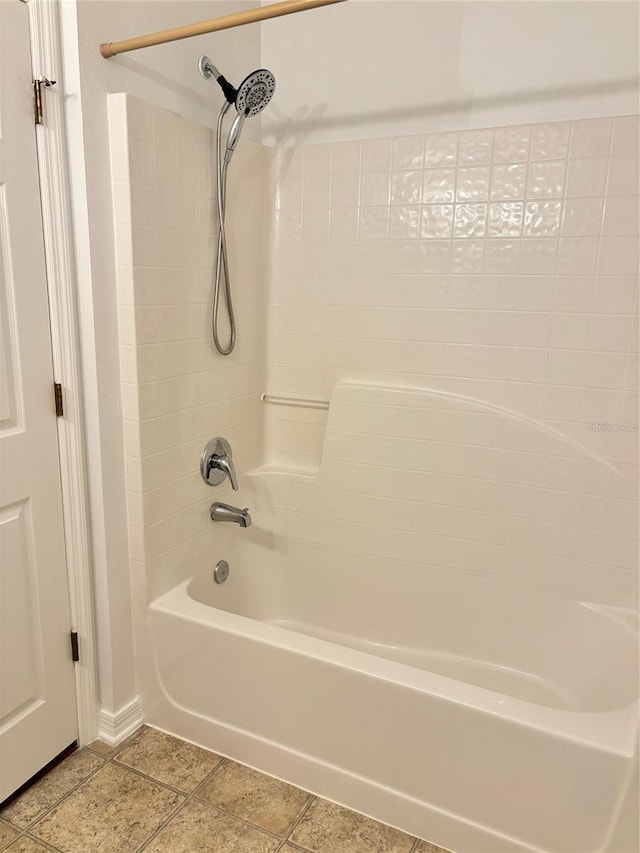 bathroom with shower / bathtub combination and tile patterned flooring