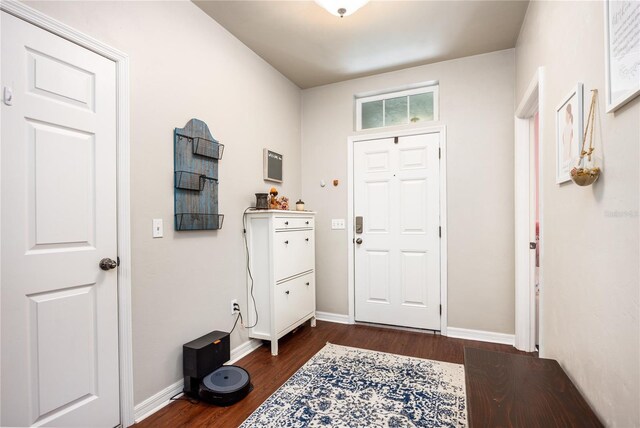 entrance foyer featuring dark hardwood / wood-style floors