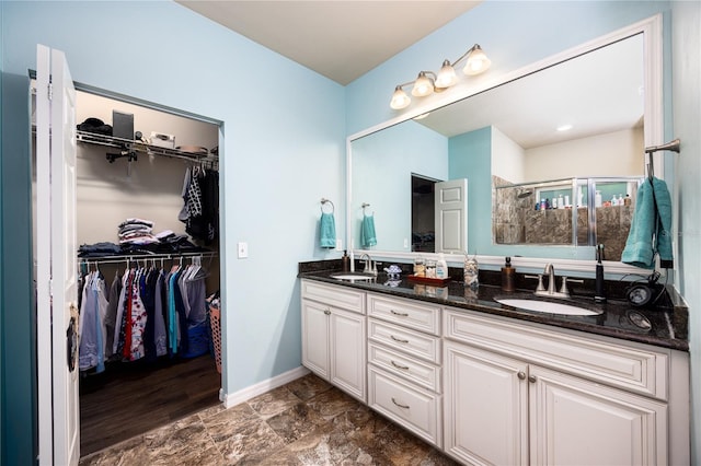 bathroom featuring vanity, hardwood / wood-style floors, and an enclosed shower