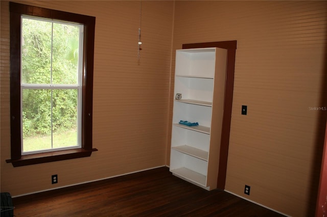 21317 SE 111th Ave, Hawthorne, FL 32640 - spare room featuring dark wood-type flooring and baseboards