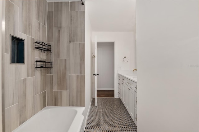 bathroom featuring tile patterned flooring and vanity