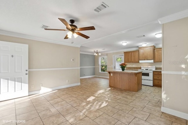 kitchen with crown molding, ceiling fan, light tile patterned floors, electric range, and a center island