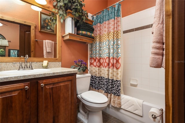 full bathroom featuring toilet, shower / bathtub combination with curtain, and vanity