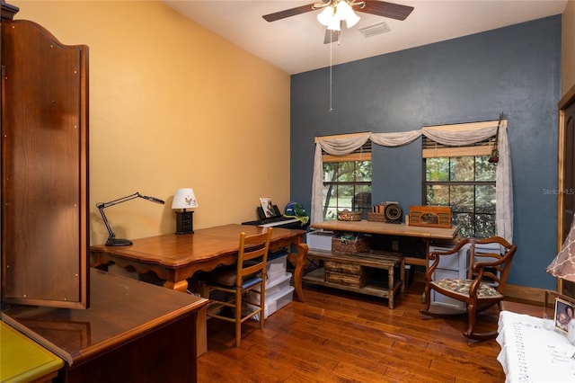 home office with hardwood / wood-style flooring and ceiling fan