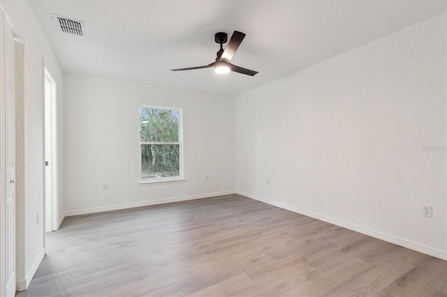 unfurnished bedroom with ceiling fan and light wood-type flooring