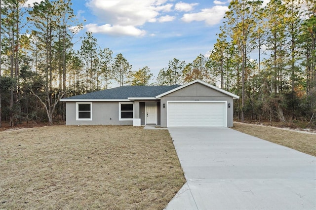 ranch-style house with a garage and a front yard