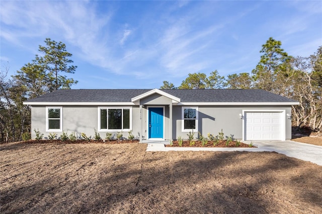 single story home with a garage