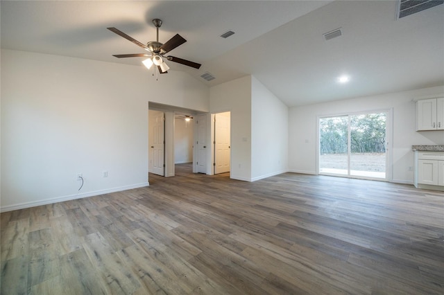 unfurnished living room with lofted ceiling, light hardwood / wood-style floors, and ceiling fan