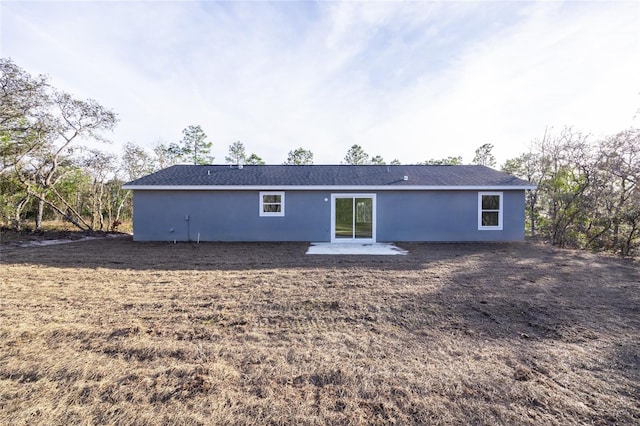 back of property featuring a patio area