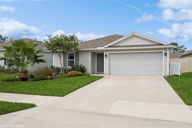 ranch-style home with a garage and a front lawn