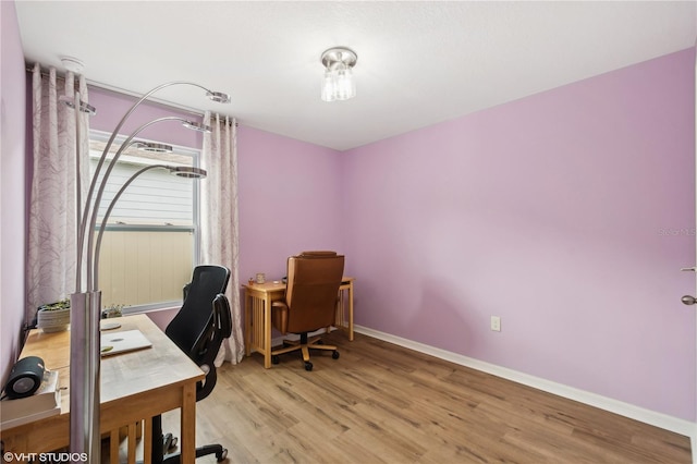 office space featuring light wood-type flooring