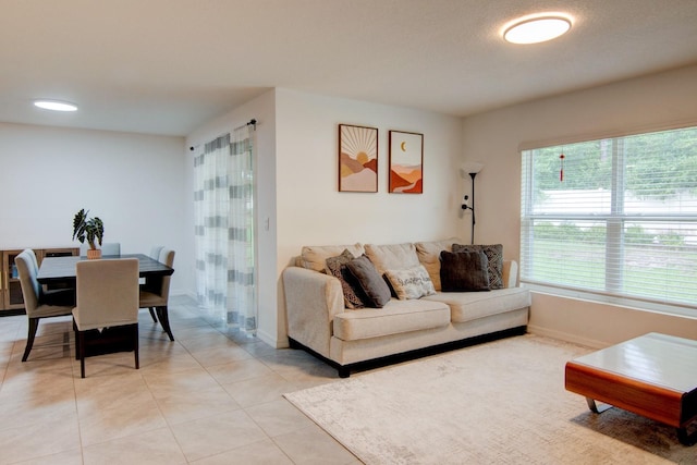 living room with light tile patterned floors