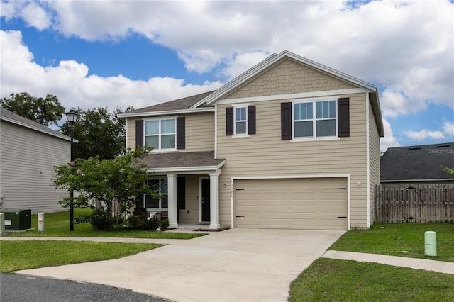 view of front of house featuring central AC, a front lawn, and a garage