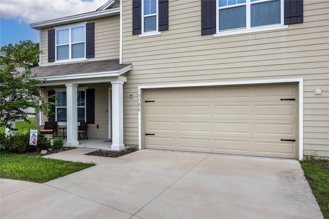 exterior space with a garage