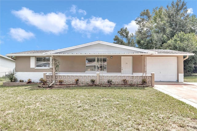 ranch-style home featuring a garage, a front lawn, and covered porch