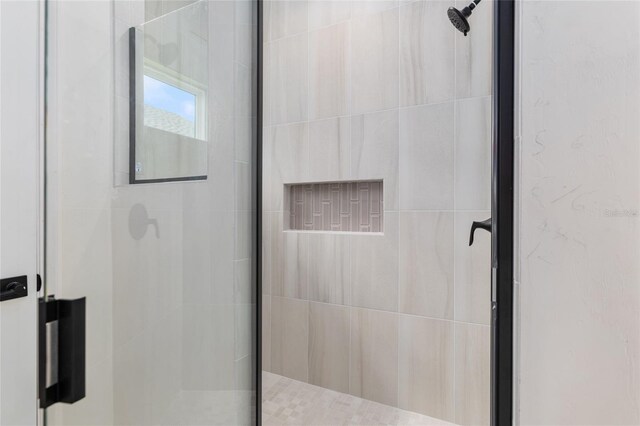 bathroom featuring walk in shower