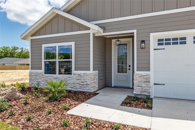 property entrance featuring a garage