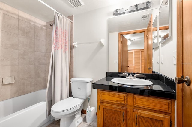 full bathroom with shower / bath combo, vanity, toilet, and tile patterned floors