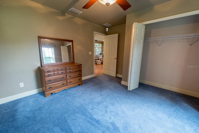 unfurnished bedroom with a closet, ceiling fan, and carpet floors