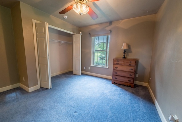 unfurnished bedroom featuring ceiling fan, a closet, and carpet flooring