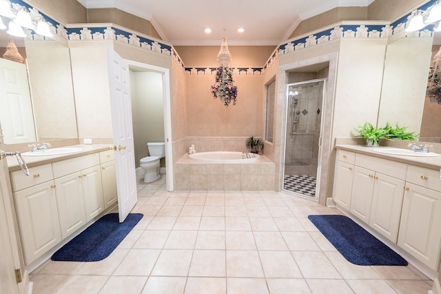 full bathroom featuring plus walk in shower, crown molding, vanity, and toilet