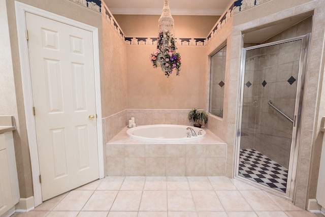 bathroom with plus walk in shower, tile patterned floors, and ornamental molding