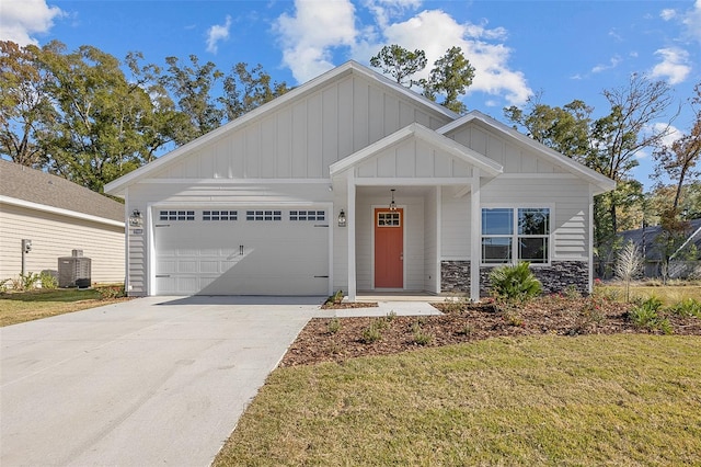 view of front of home featuring a garage and a front lawn