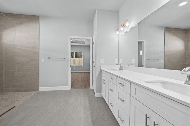 bathroom featuring hardwood / wood-style floors and vanity