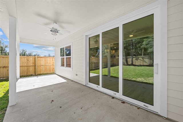 view of patio with ceiling fan