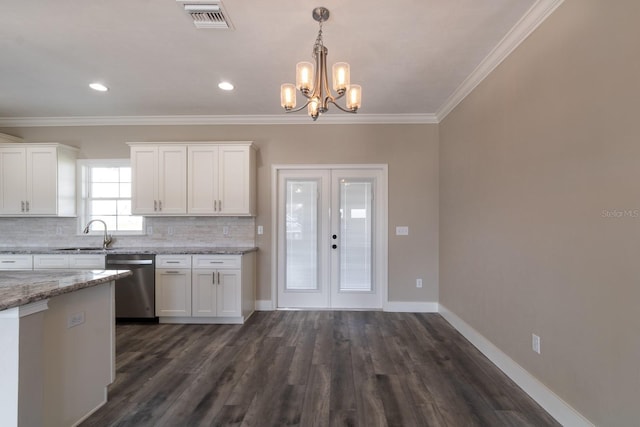 kitchen with stainless steel dishwasher, light stone counters, crown molding, dark hardwood / wood-style floors, and white cabinetry