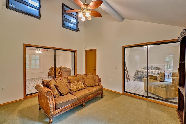 carpeted living room featuring ceiling fan, beamed ceiling, and high vaulted ceiling