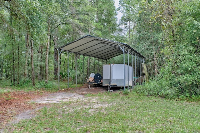 view of yard with a carport