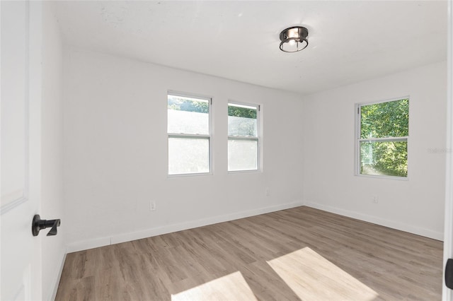 empty room featuring light hardwood / wood-style floors