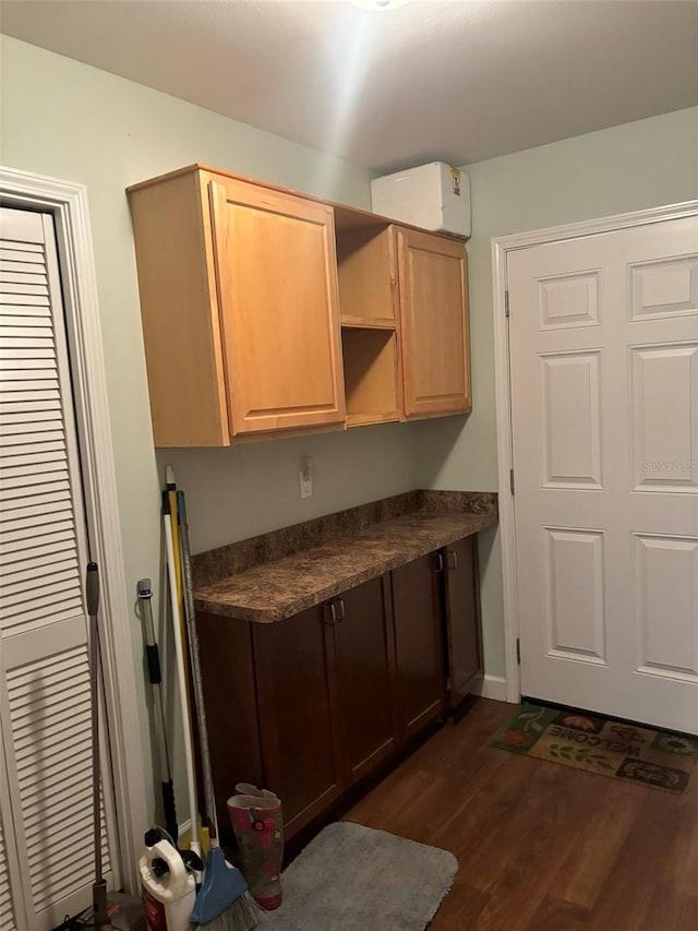 kitchen featuring dark hardwood / wood-style flooring