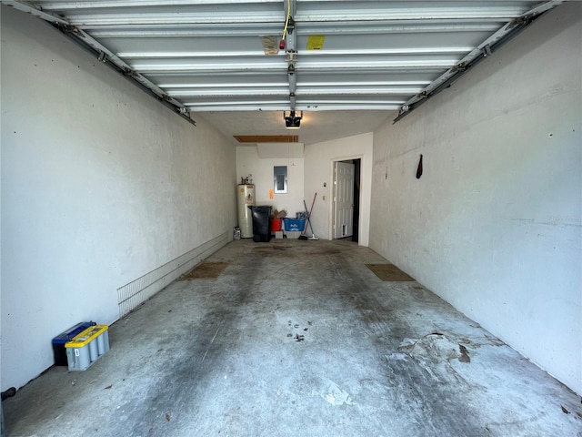 garage featuring a garage door opener, electric panel, and water heater