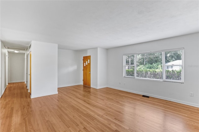 empty room with light wood-type flooring