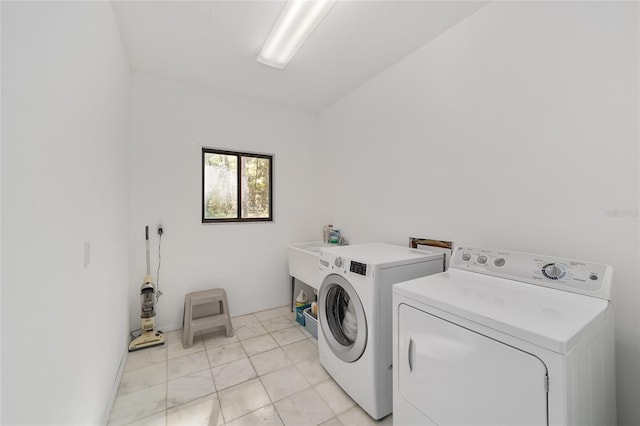 laundry area featuring washer and clothes dryer