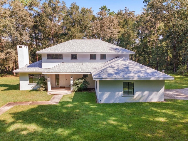 view of front of property with a front lawn