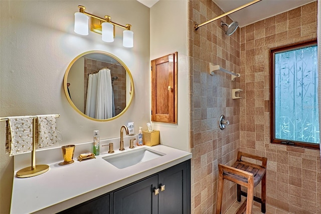 bathroom with a shower with curtain and vanity