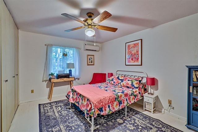 bedroom with ceiling fan, a closet, and a wall unit AC