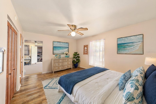 bedroom with a closet, ceiling fan, and hardwood / wood-style floors