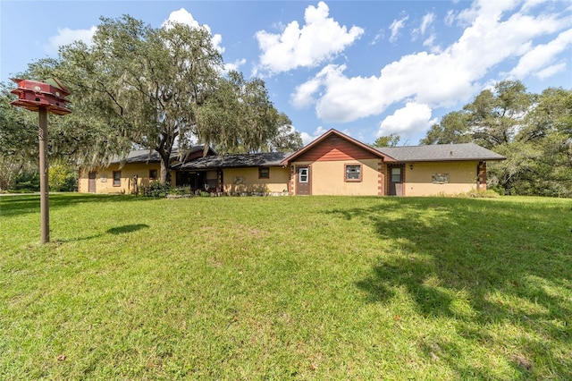 exterior space with a front lawn