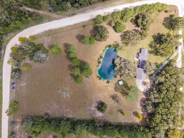 birds eye view of property featuring a rural view