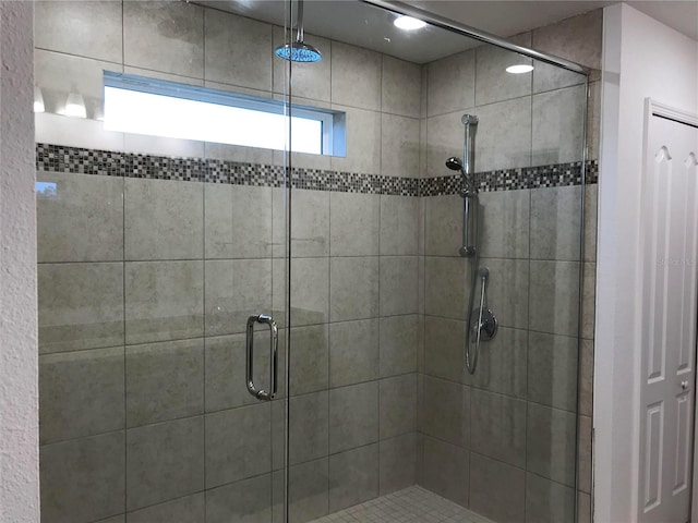 bathroom with an enclosed shower